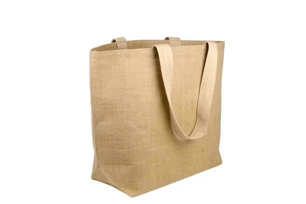 Natural jute tote with wide woven handles for reusable packaging.