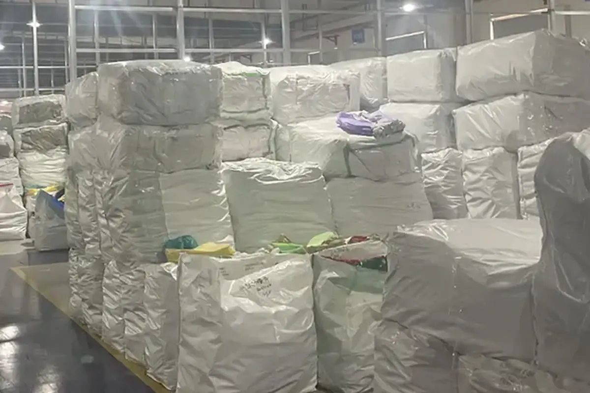 Sorted bulk material sacks arranged in a tote bag production area.