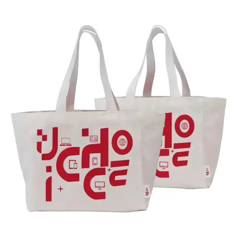 Pair of natural 14 oz canvas totes with red printed artwork.