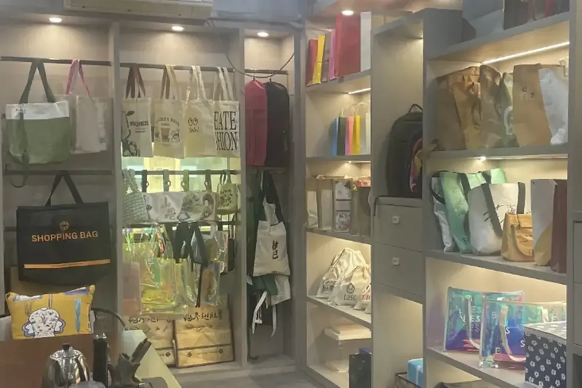 Canvas tote samples arranged inside a factory display room