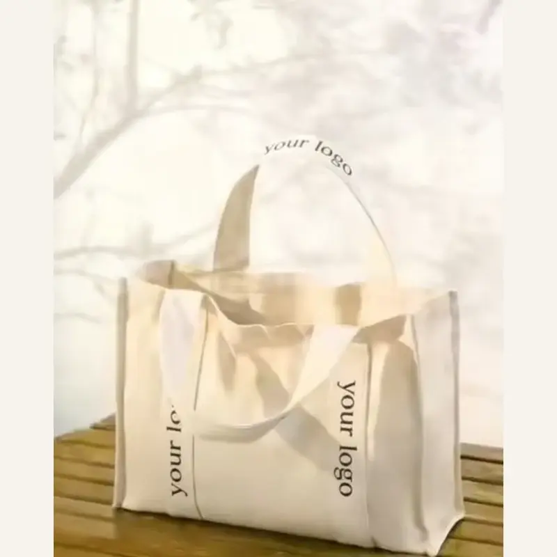 Translucent heavyweight canvas tote with reinforced short handles