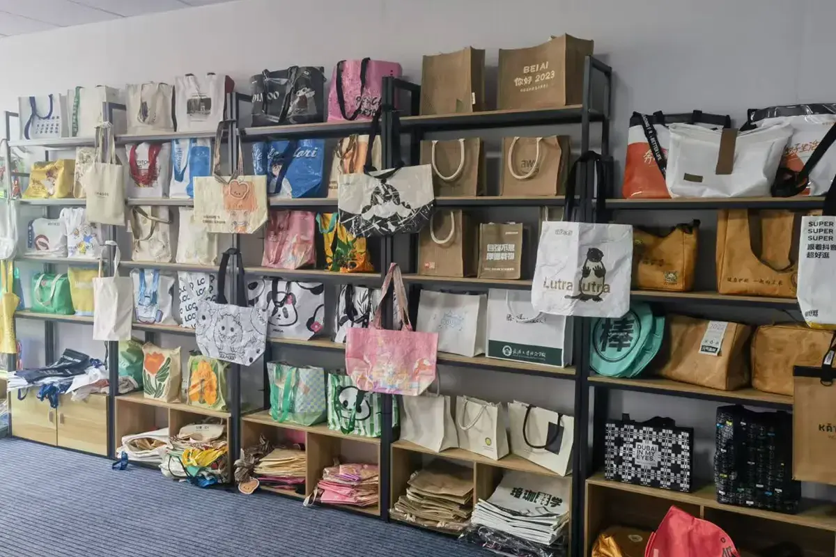Tote bag sample wall for corporate program selection