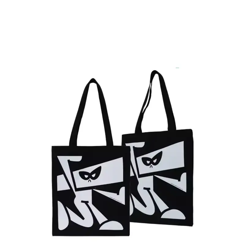 Black and white graphic canvas tote pair with long black handles