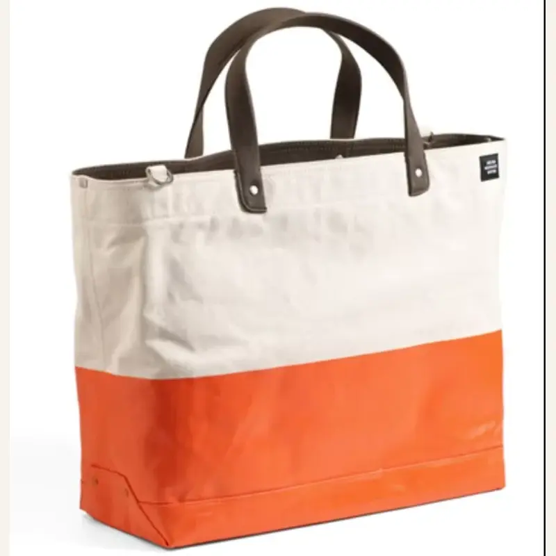 Heavy canvas tote with orange base and reinforced handles