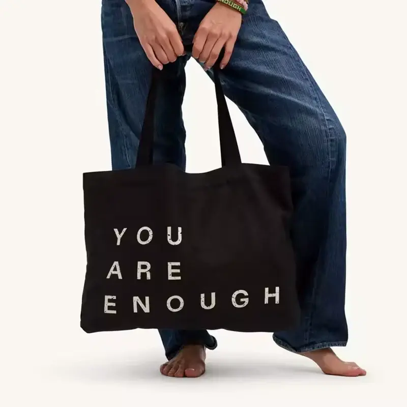 Large black canvas tote with short reinforced handles