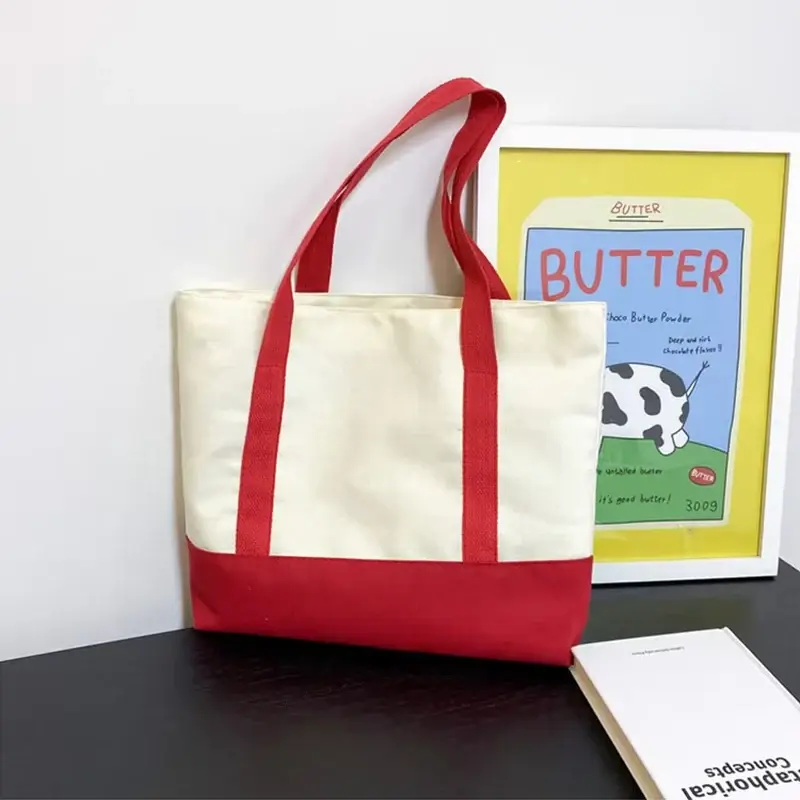 Canvas tote bag with reinforced red webbing handles