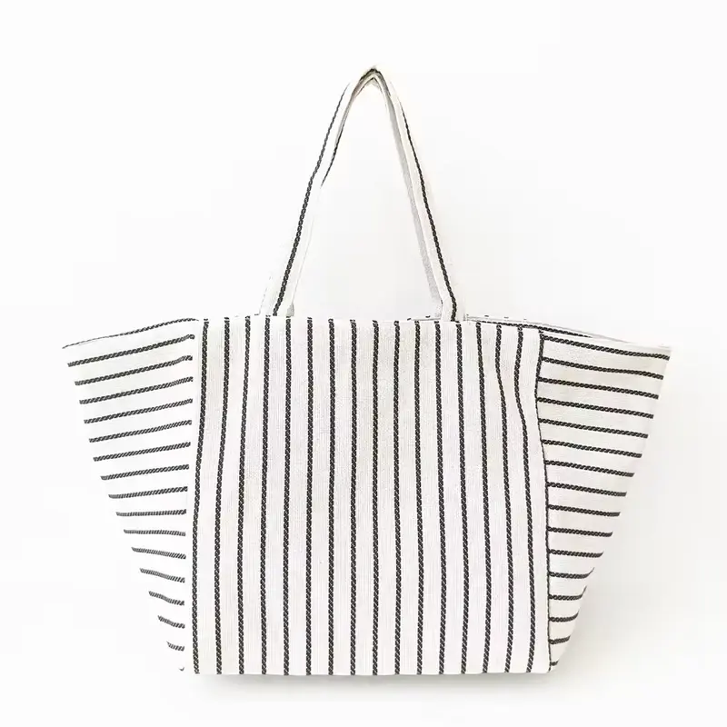 Striped gusseted canvas shopping tote with long shoulder handles