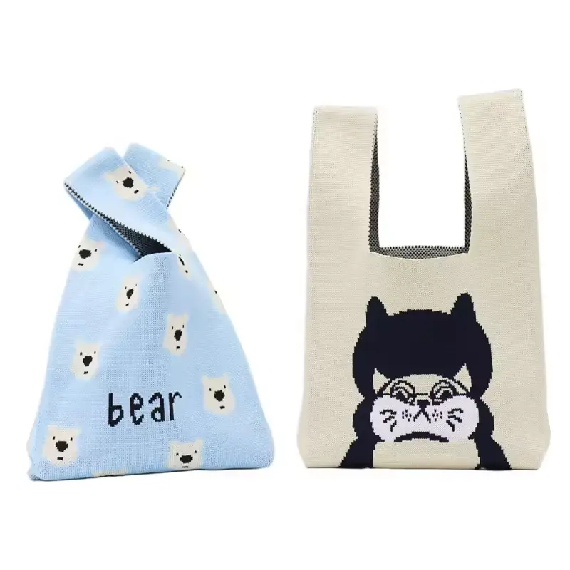 Two lightweight cotton totes with integrated handles and prints