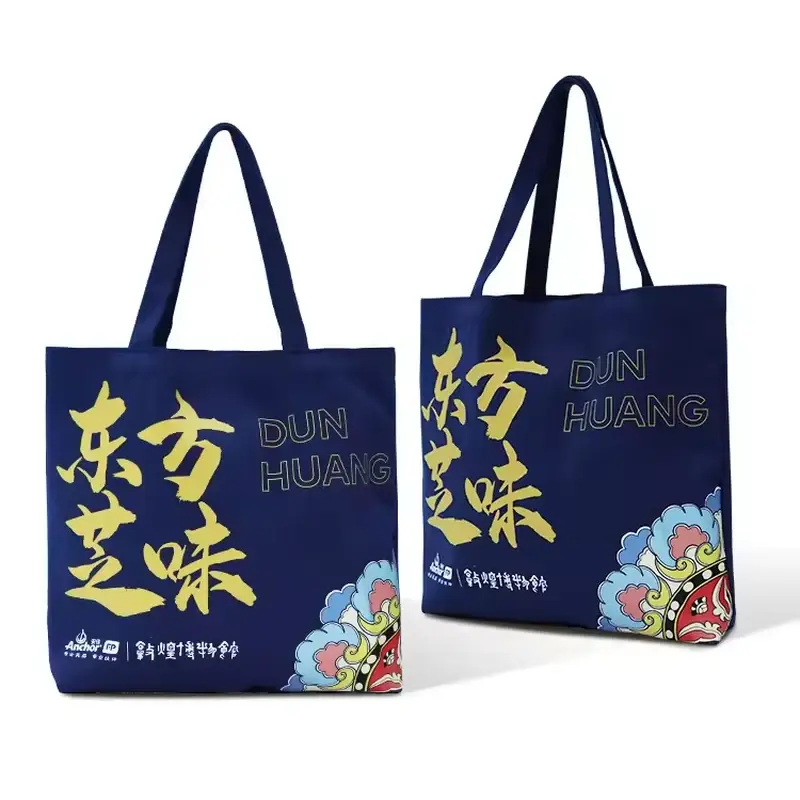 Navy cotton tote bag pair with long handles and printed artwork
