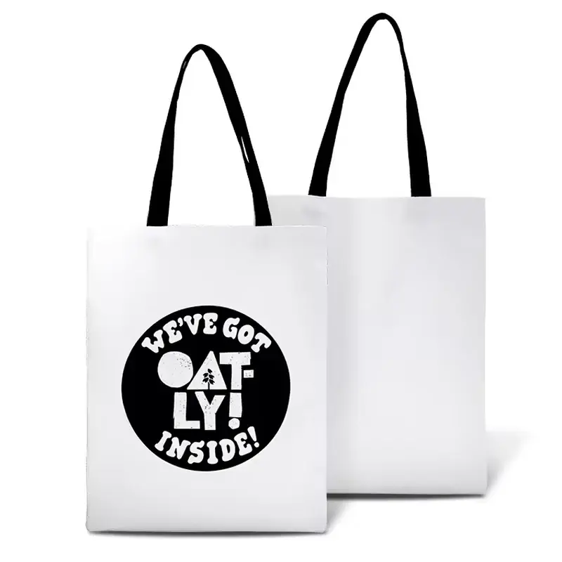 White cotton long-handle tote with a bold black circular print