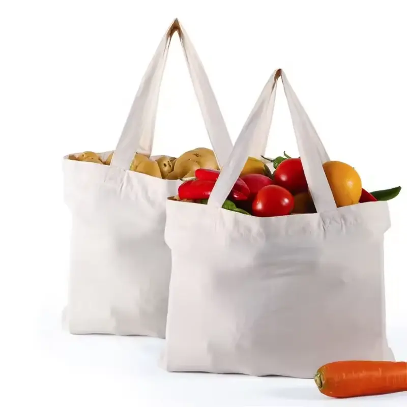 White cotton shopping tote filled with fresh produce