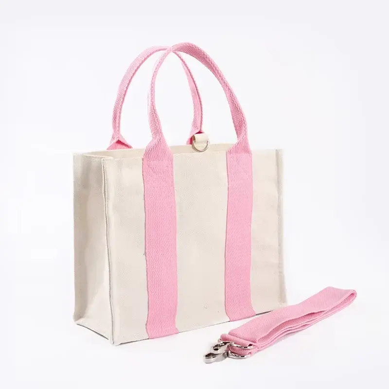 Natural canvas zipper tote with pink webbing and detachable strap