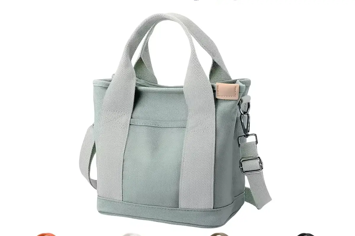 Sage canvas zipper tote with reinforced handles and shoulder strap