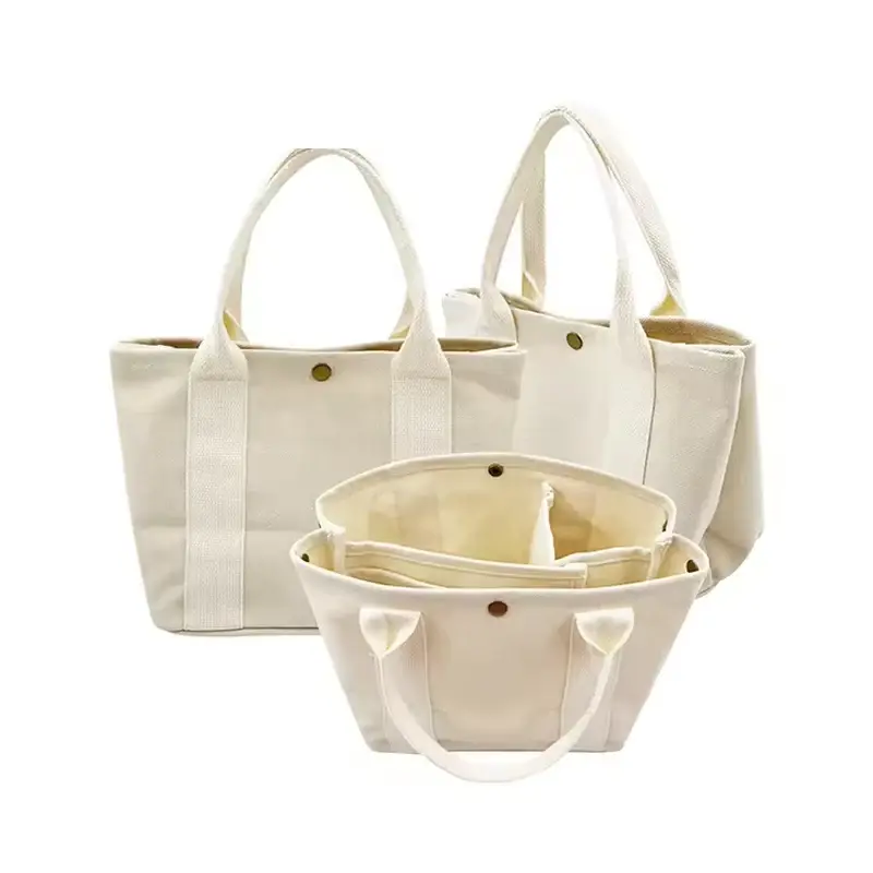 White canvas totes shown from front side and open interior views