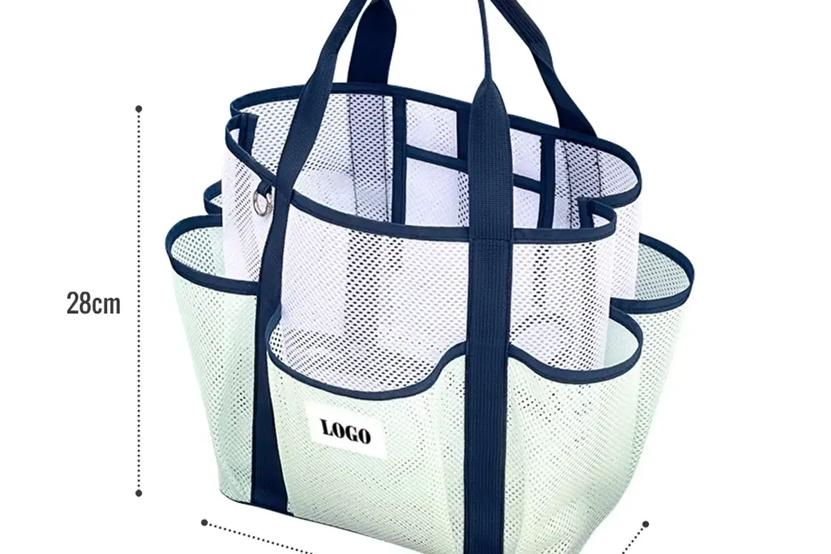 Navy trimmed clear tote showing side pockets and attached pouch