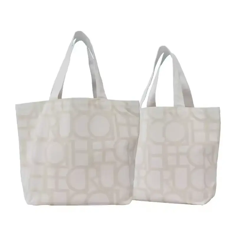 Two patterned heavyweight canvas totes with long handles