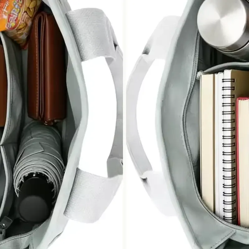Gray canvas tote opened to show organized interior compartments