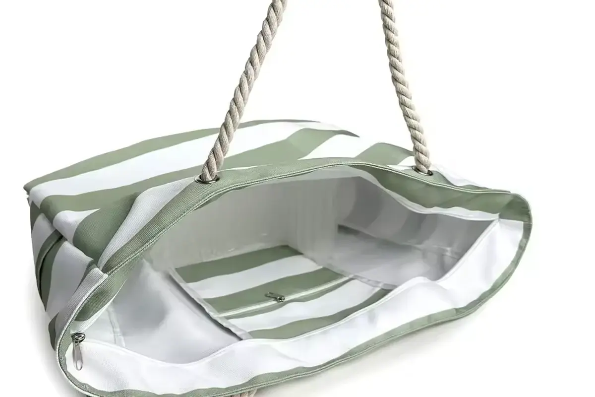Open striped tote showing the zipper facing and interior lining