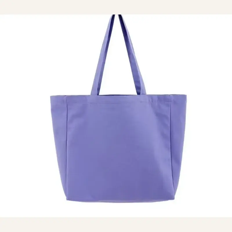 Purple boxy canvas tote with a concealed top zipper