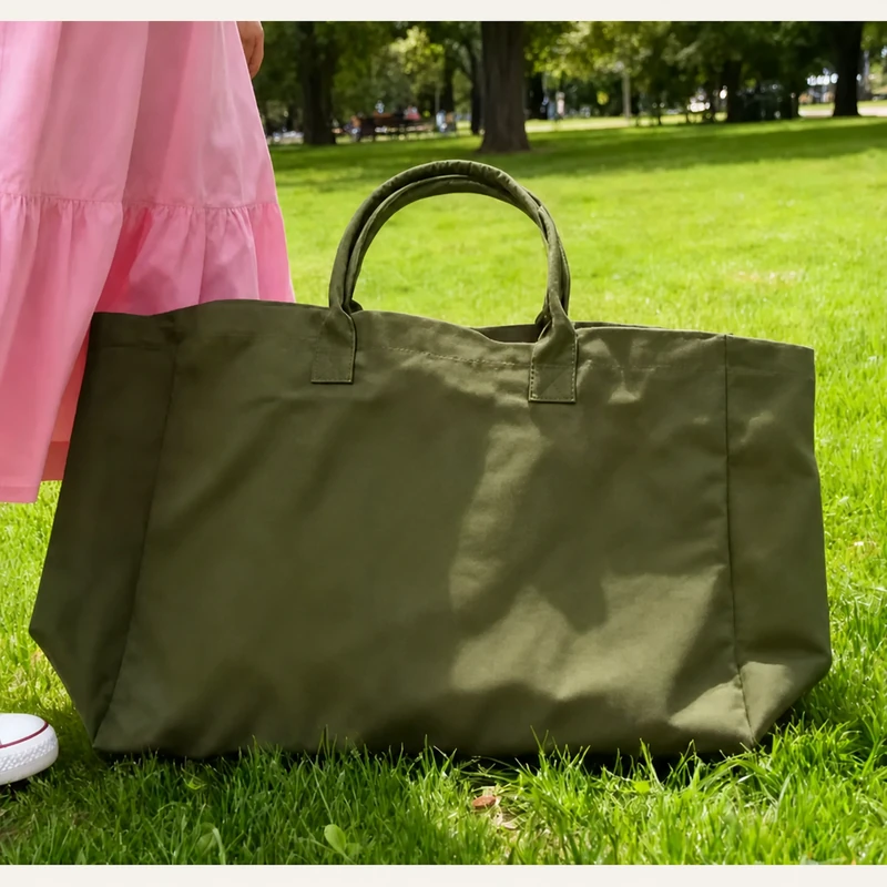 Green 14 oz heavyweight canvas tote with short handles