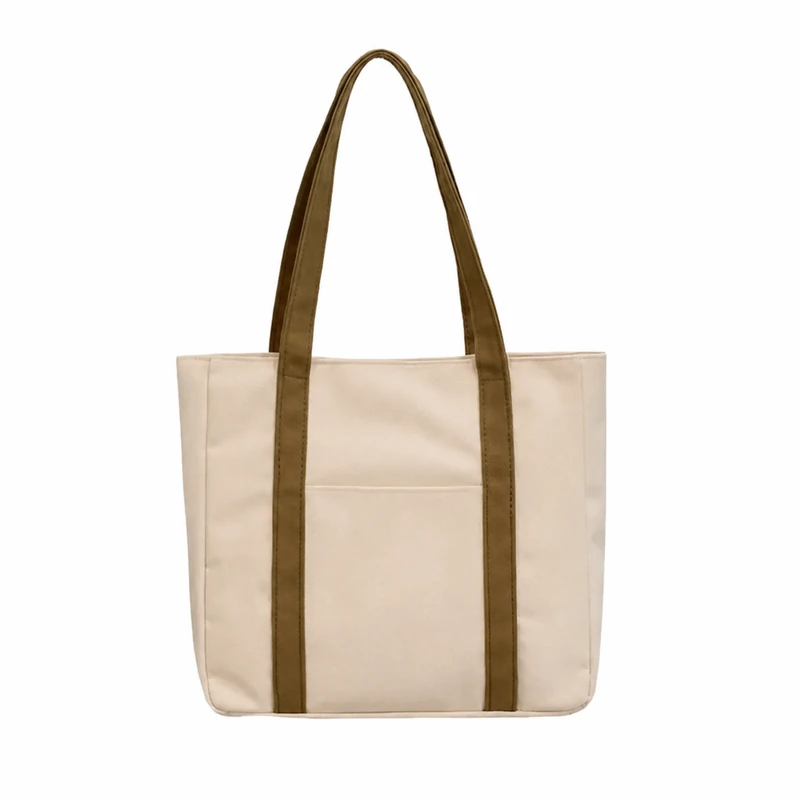Natural cotton tote with long brown handles and a wide body