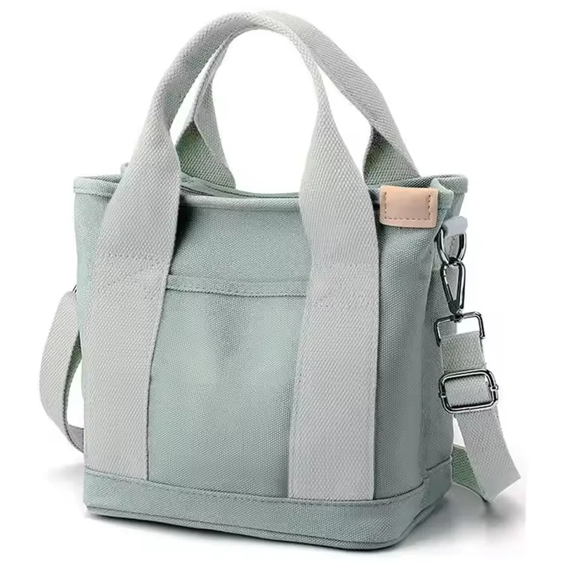 Gray canvas zipper tote with multiple inner and outer pockets